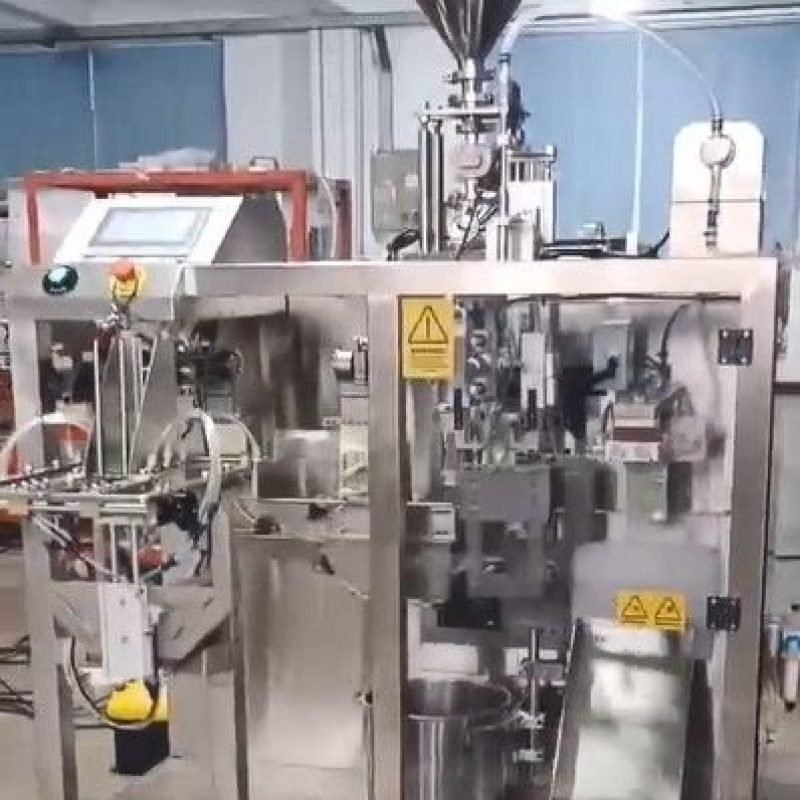 Industrial nicotine pouch filling system